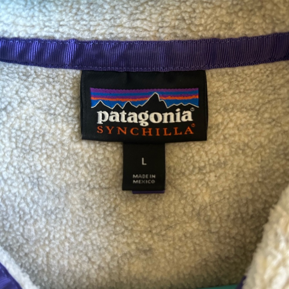 Patagonia cream/navy blue size women’s large synchilla.